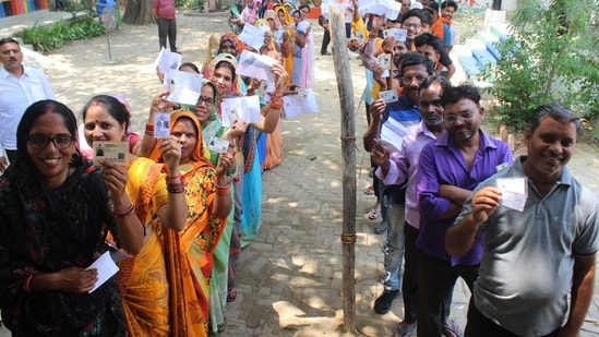 Voters standing in a queue to cast their vote at a polling station during Lok Sabha election. (HT Photo) Voters standing in a queue to cast their vote at a polling station during Lok Sabha election. (HT Photo)