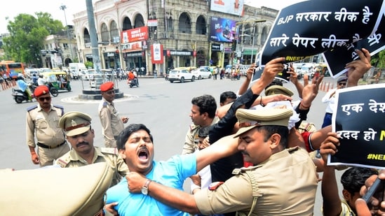 Lucknow, Jun 20 (ANI): Police detain National Students' Union of India (NSUI) supporters and students during a protest demanding the resignation of Union Education Minister Dharmendra Pradhan over the alleged paper leak in the UGC NET exam, in Lucknow on Thursday. 