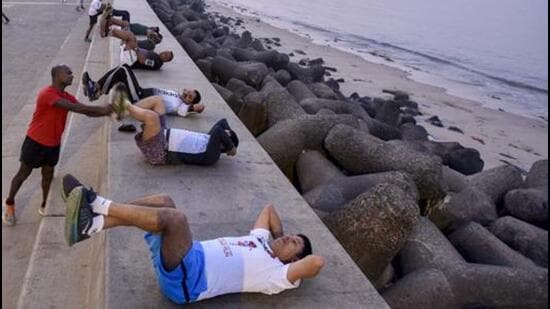 People exercising at Marine Drive in Mumbai. (Kunal Patil/HT File Photo)