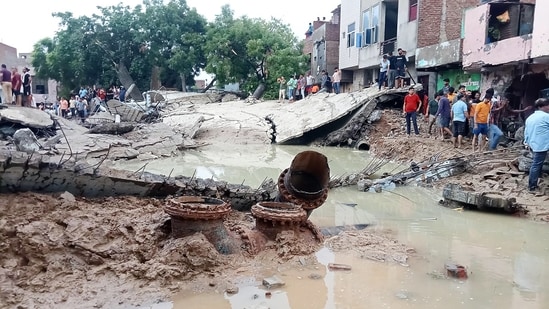 The water tank of the municipal corporation collapsed due to a heavy downpour in Mathura on Sunday. (ANI Photo) (K.K.Arora)