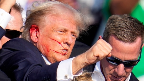 Latest news on July 20, 2024: Republican presidential candidate Donald Trump reacts following an assassination attempt at a campaign event in Butler, Pennsylvania, on Saturday, July 13, 2024. Latest news on July 20, 2024: Republican presidential candidate Donald Trump reacts following an assassination attempt at a campaign event in Butler, Pennsylvania, on Saturday, July 13, 2024.