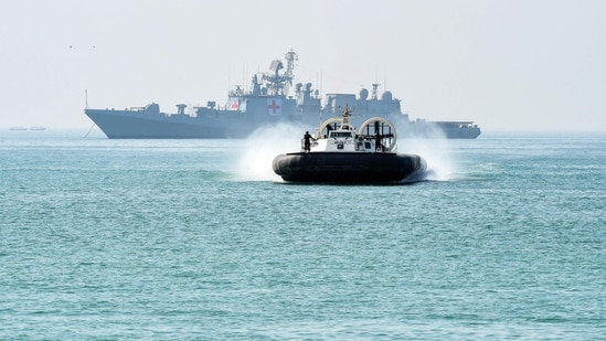 An Indian Coast Guard hovercraft (front) and Indian Navy's national hospital ship (NHS) participate during Sanyukt Vimochan 2024, a multilateral joint exercise in Porbandar in November 2024. (AFP/Representative) An Indian Coast Guard hovercraft (front) and Indian Navy's national hospital ship (NHS) participate during Sanyukt Vimochan 2024, a multilateral joint exercise in Porbandar in November 2024. (AFP/Representative)