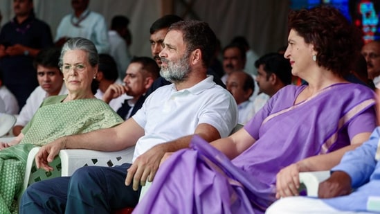 Congress General Secretary Priyanka Gandhi Vadra with party leader Rahul Gandhi and Congress Parliamentary Party chief Sonia Gandhi during a public meeting (AICC)