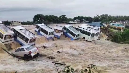**EDS: BEST QUALITY AVAILABLE** Krishnagiri: Swept away vehichles in flooded Uthangarai area following heavy rainfall in the aftermath of Cyclone Fengal, in Krishnagiri district, Tamil Nadu, Monday, Dec. 2, 2024. (PTI Photo) (PTI12_02_2024_000166B)(PTI) **EDS: BEST QUALITY AVAILABLE** Krishnagiri: Swept away vehichles in flooded Uthangarai area following heavy rainfall in the aftermath of Cyclone Fengal, in Krishnagiri district, Tamil Nadu, Monday, Dec. 2, 2024. (PTI Photo) (PTI12_02_2024_000166B)(PTI)