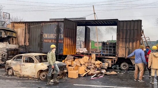 Firefighters at the site of the accident after a truck loaded with a chemical collided with some other vehicles and caught fire on the Jaipur-Ajmer Highway.(PTI) Firefighters at the site of the accident after a truck loaded with a chemical collided with some other vehicles and caught fire on the Jaipur-Ajmer Highway.(PTI)
