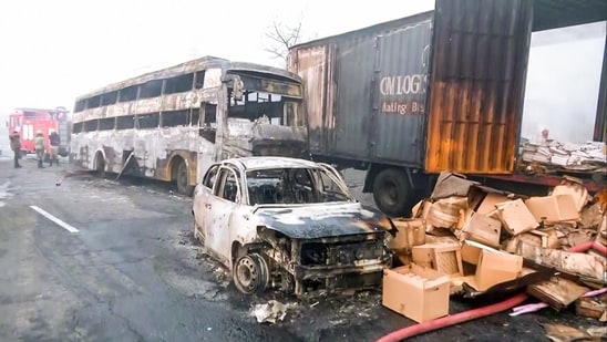 Charred remains of vehicles at the site of the accident after a massive fire started due to a collision between a gas tanker and multiple vehicles near a petrol pump on the Jaipur-Ajmer Highway.(ANI) Charred remains of vehicles at the site of the accident after a massive fire started due to a collision between a gas tanker and multiple vehicles near a petrol pump on the Jaipur-Ajmer Highway.(ANI)