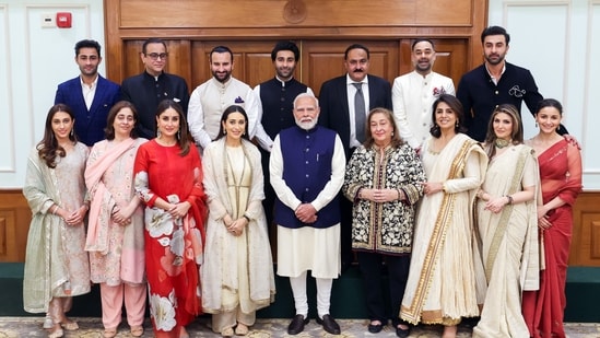 Prime Minister Narendra Modi poses for a group picture with the Kapoor family during their meet ahead of the upcoming Raj Kapoor 100 Film Festival on Raj Kapoor's centenary, in New Delhi on Tuesday. Neetu Kapoor, Karisma Kapoor, Kareena Kapoor, Saif Ali Khan, Ranbir Kapoor, Alia Bhatt and others present.(ANI)