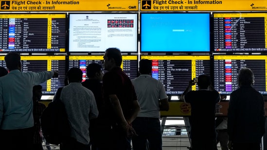 Passengers look at screens at T3 Terminal of the Indira Gandhi International Airport amid Microsoft outage, in New Delhi, Friday, July 19, 2024. (File Photo/PTI) Passengers look at screens at T3 Terminal of the Indira Gandhi International Airport amid Microsoft outage, in New Delhi, Friday, July 19, 2024. (File Photo/PTI)