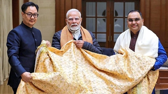 New Delhi, Jan 02 (ANI): Prime Minister Narendra Modi hands over a ceremonial 'Chadar' to Union Minister of Parliamentary Affairs Kiren Rijiju and BJP Minority Morcha President Jamal Siddiqui to be offered on his behalf at Ajmer Sharif Dargah on the occasion of 813th Urs of Khwaja Moinuddin Chisti, in New Delhi on Thursday. (ANI Photo) (Kiren Rijiju - X)