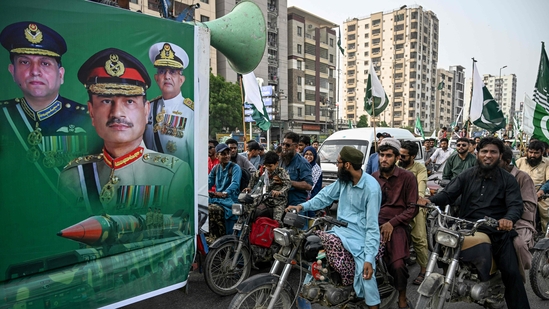 Activists of the Pakistan Markazi Muslim League take part in a rally marking 'Youm-e-Takbeer' in Karachi on May 28, 2025.(AFP) Activists of the Pakistan Markazi Muslim League take part in a rally marking 'Youm-e-Takbeer' in Karachi on May 28, 2025.(AFP)