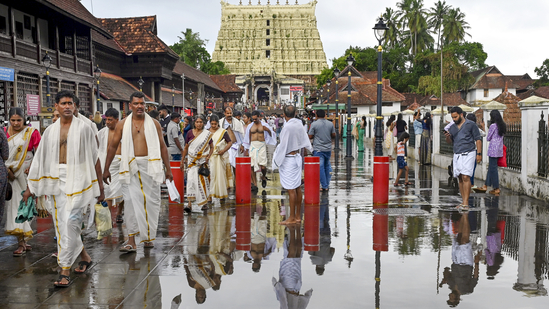 Thiruvananthapuram: People at the premises of Sree Padmanabhaswamy Temple after rainfall, in Thiruvananthapuram, Friday, May 23, 2025.(PTI)